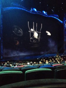 A 3D image was projected above the stage before the show started.  A glove, hat, glasses, and shoes floated around and upside-down barstool.  No 3D glasses required, btw.